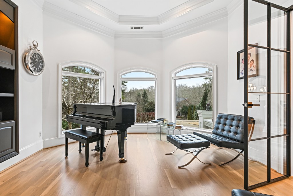 Refinished white oak floor in a window-lit sitting room — NordicSeal neutral, Hoschton GA