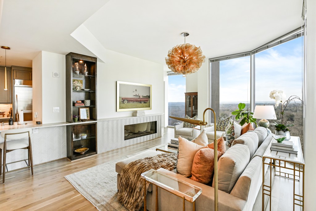 White oak floors finished on site in Buckhead Atlanta high-rise condo (Classy Flooring ATL)