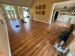 Finished red oak floor after lace-in repair and full refinishing in Atlanta living area