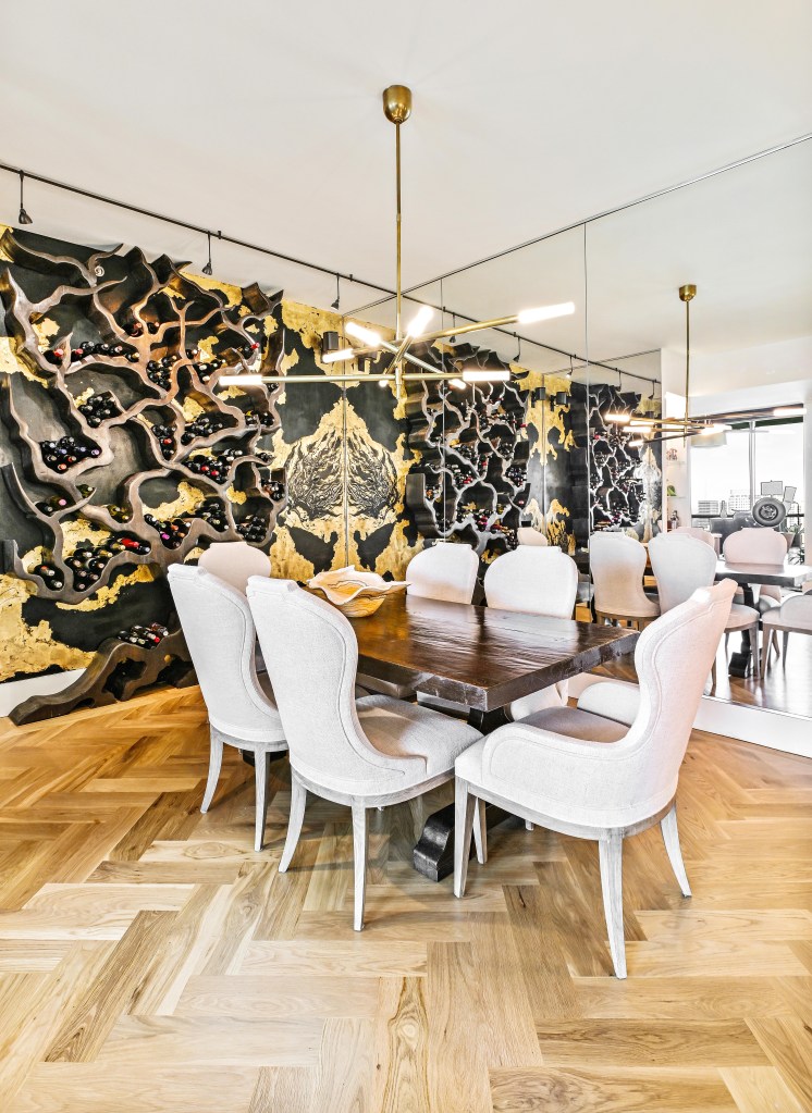 Finished white oak herringbone floor with 7-inch custom border in the dining area of a Buckhead high-rise, Atlanta.