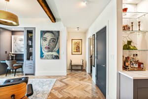 Finished white oak herringbone floor with 7-inch custom border in Buckhead high-rise condominium, Atlanta