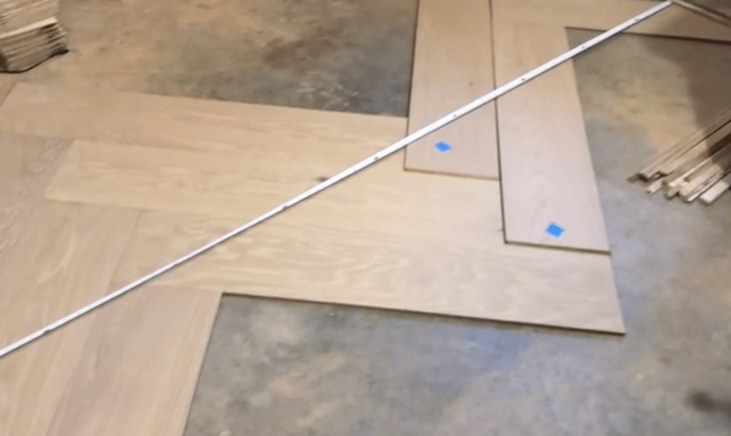 Mock-up for custom herringbone and border installation using prefinished engineered oak flooring in Atlanta