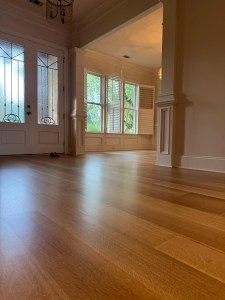 7-inch site-finished white oak — foyer with double entry doors, Chateau Elan country club residence, Braselton GA
