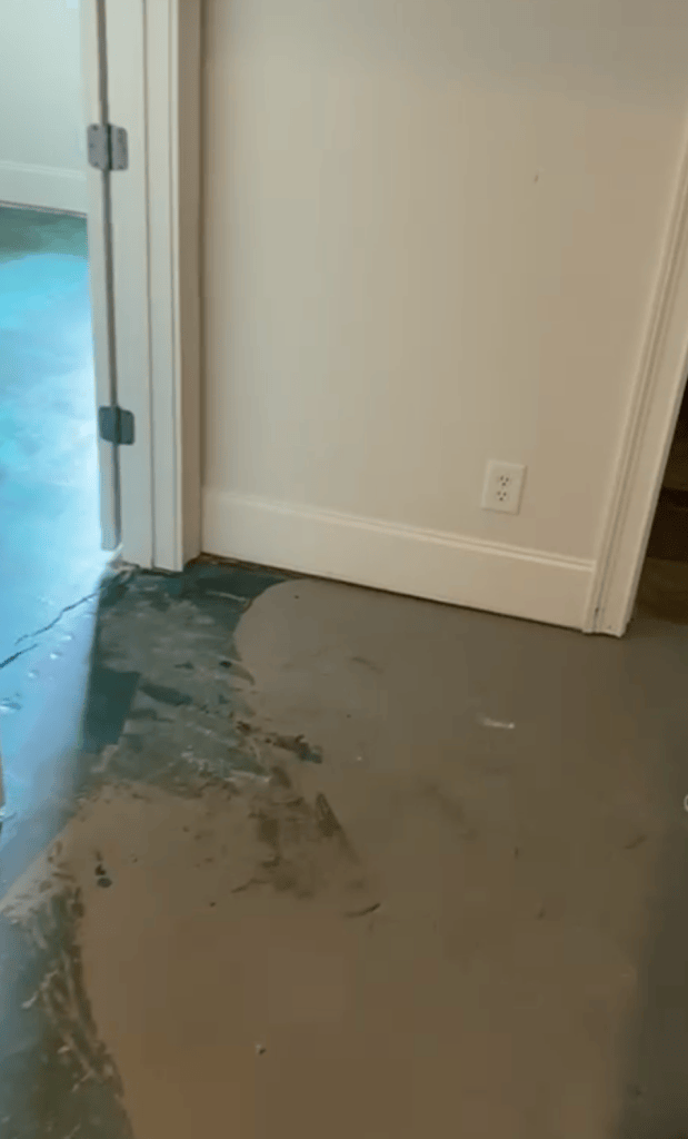 Self-leveling underlayment on concrete slab — subfloor preparation for wide plank engineered hardwood, Chateau Elan