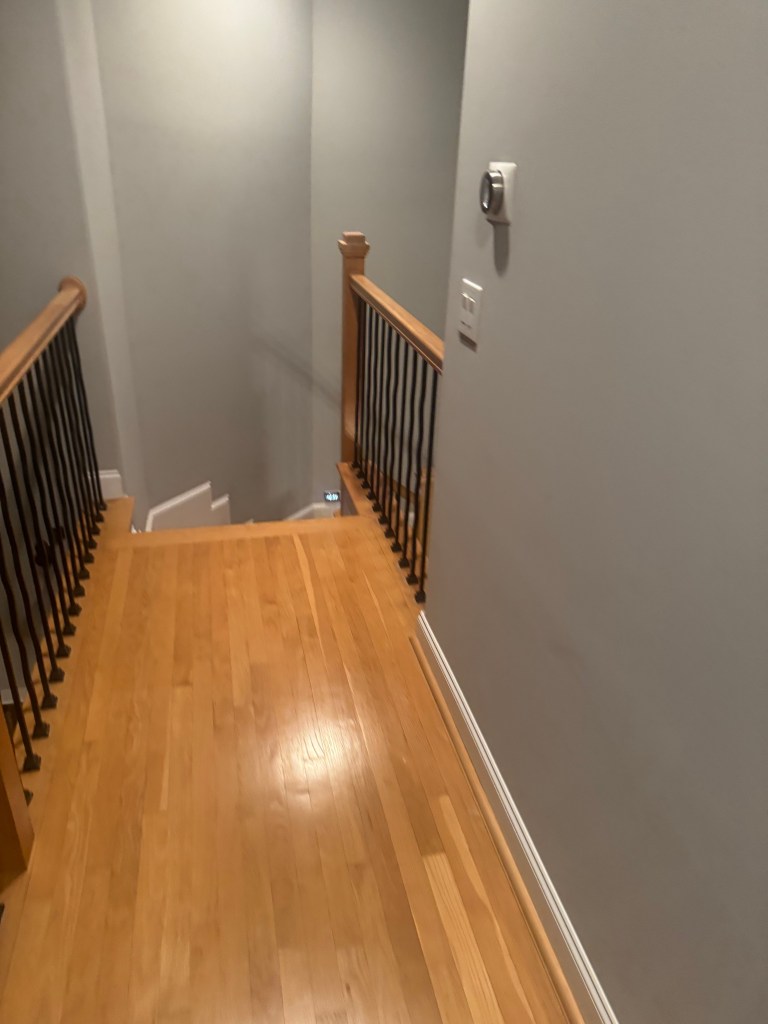 White oak hardwood floor before refinishing — yellow amber tone, Hoschton GA