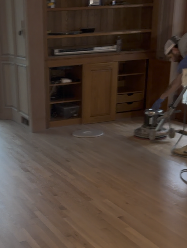 FG Discus planetary sander during white oak floor refinishing in Buckhead residence.