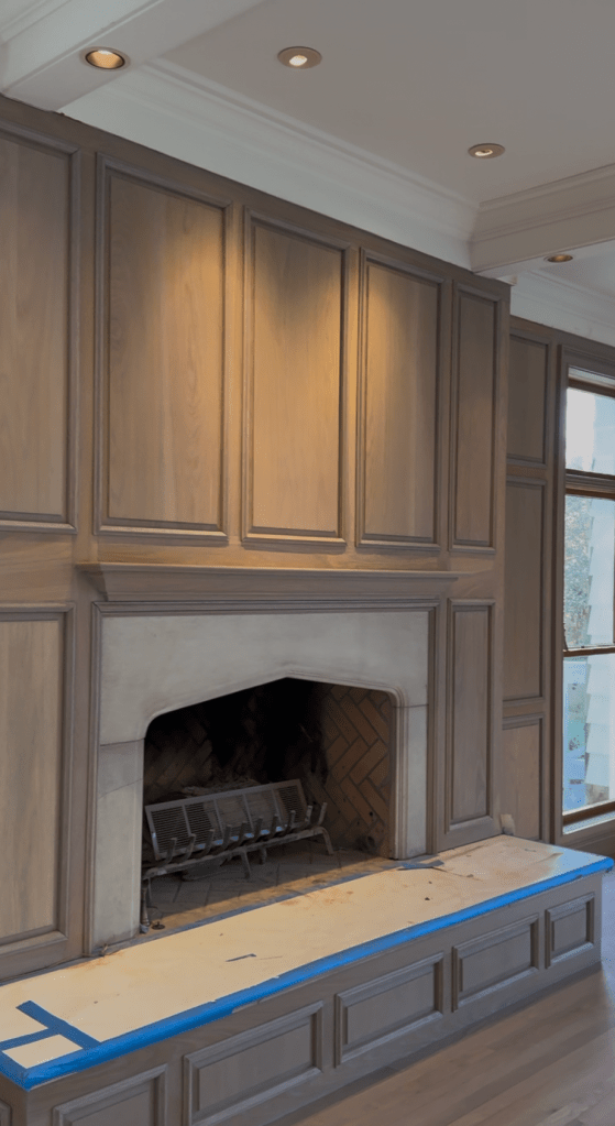 Classy Flooring ATL — refinished solid oak paneling in Rubio Monocoat Linen, Buckhead Atlanta great room with limestone fireplace