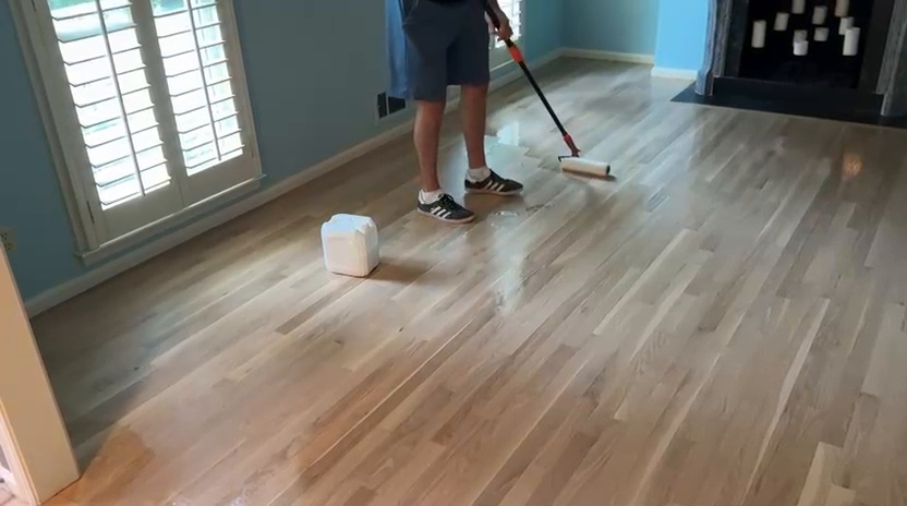 Rolling finish across the room during hardwood floor color matching in Dunwoody GA
