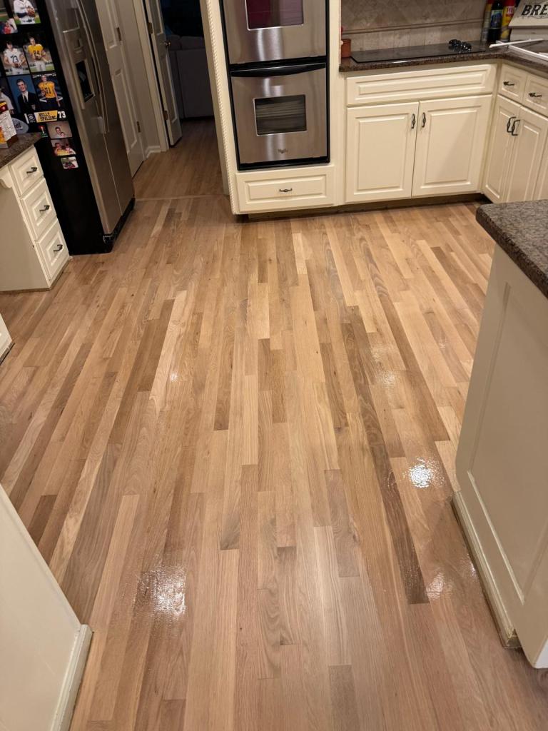 Freshly applied coat of LOBA 2K Duo on the refinished white oak kitchen floor, Dunwoody GA