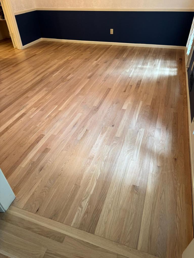 Refinished white oak floor after the final clear coat, Dunwoody GA