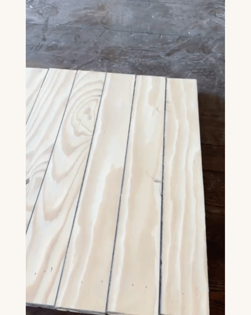 Pine sample piece sanded flat with board joints filled in black using Berger-Seidle AquaSeal PAK-Stop and AquaSeal Pafuki Powder, no stain applied, Big Canoe, Georgia